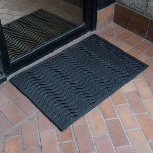 Able to withstand outdoor conditions, rubber mats are placed outdoors where their texture surface can effectively scrape away dirt and debris in the presence of moisture.